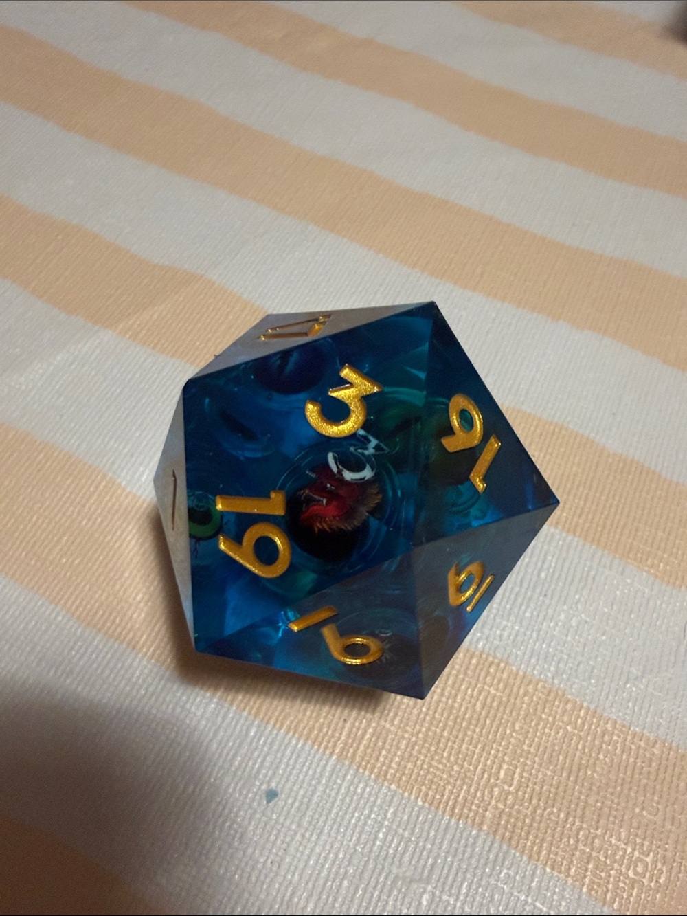 Liquid core D20 Gaming Die with Gold Numerals